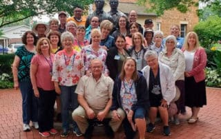 Happy Group At A Church History Tour