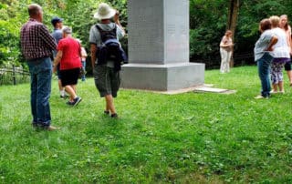 Group Of Visitors At Eight Witnesses Monument in Clay County, Missouri