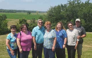 Happy Visitors At A Church History Tour